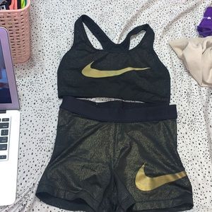 black and gold nike sports bra and pro shorts, S/M